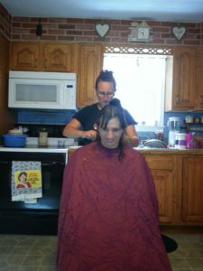 Mell cutting my hair for Chemo